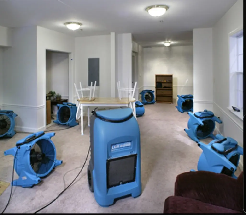 Air movers and dehumidifier setup for Water Extraction & Removal in Burke Centre